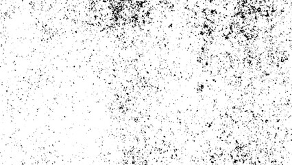 Obraz premium Dense scattered black noise dust texture overlay on white background. 