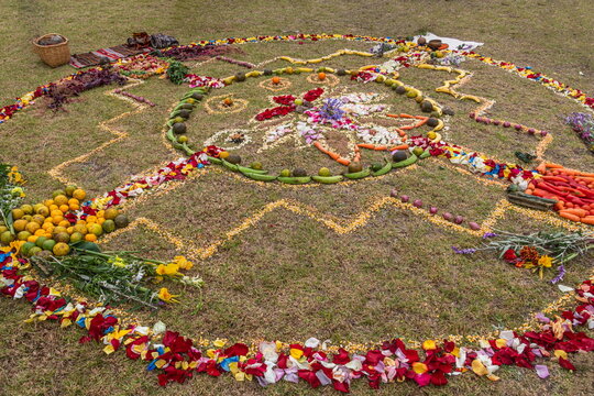 Sacred Chakana (Andean Cross), an ancient ancestral ceremony of the indigenous peoples of the central Andes made of flower petals, seeds, and natural elements, held to honor Pachamama (Mother Earth)