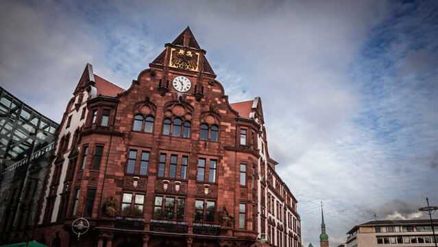 Altes Stadthaus, Dortmund former city hall built in 1899 in germany, stands as a major landmark with its red facade, ornate gables, gilded eagle crest and clock tower overlooking the city center.