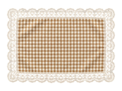 Gingham fabric napkin with lace trim on a png background