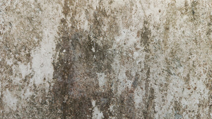 Fototapeta premium Aged concrete wall texture with peeling paint and weathered surface.