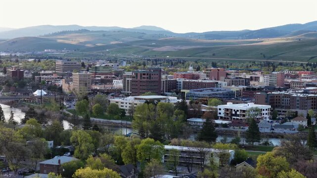 Aerial view of downtown Missoula Montana during spring morning light overlooking Clark Fork River.