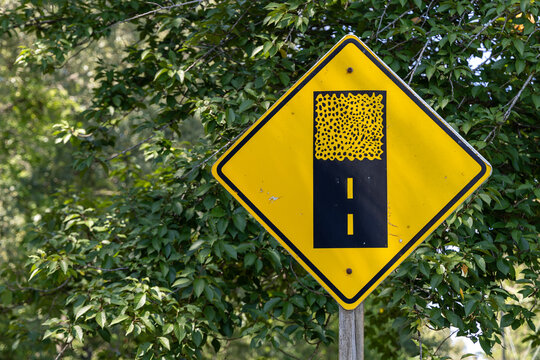 Pavement Ends Warning Sign on Rural Road