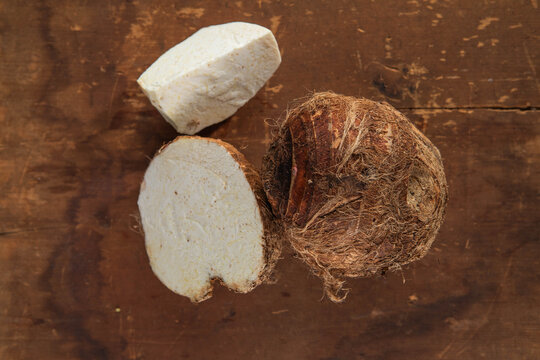 Fresh Taro Root Ion wooden table