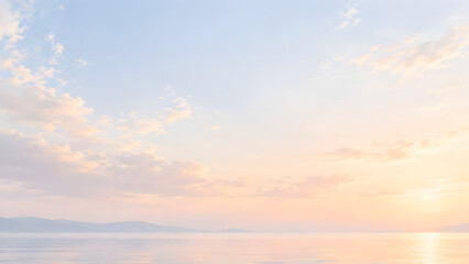 Fototapeta premium Serene Pastel Sunset Over Calm Sea with Soft Clouds and Mountain Horizon