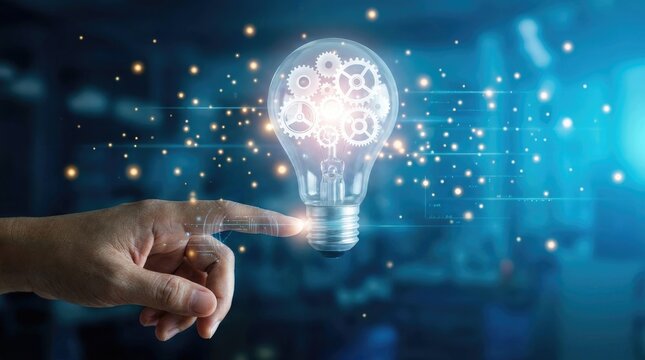 A persons finger touching a glowing light bulb containing rotating gears, symbolizing creative ideas, innovation, and problemsolving in a digital environment world science day