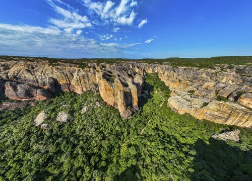Aerial of the Sandstone cliffs in the Unesco site Serra da Capivara National Park, Piaui, Brazil