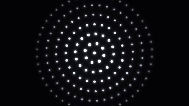 A mesmerizing array of glowing white dots forms concentric circles radiating outward across a deep dark void, creating a hypnotic visual rhythm that draws the eye toward the mesmerizing center