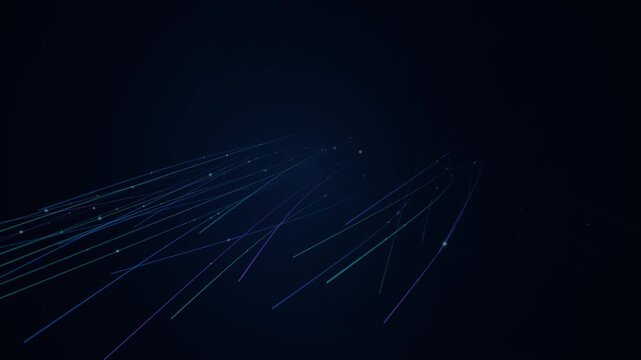 Glowing fiber optic lines flow across dark space creating a fast moving digital network connection in this dynamic motion clip