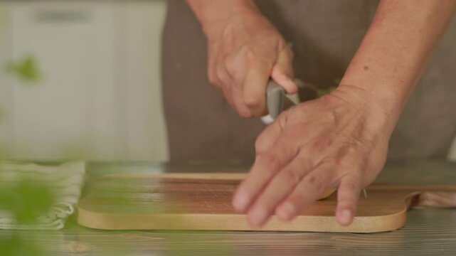 Cutting Fresh Apple with Kitchen Knife
