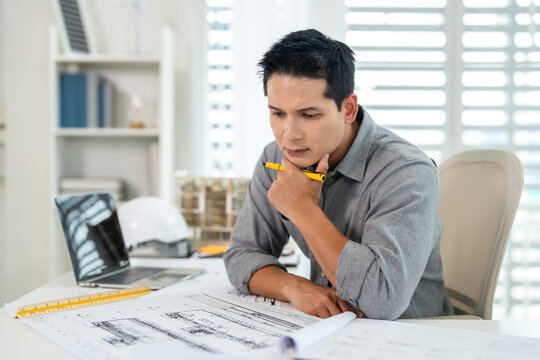Enginee working with drawings inspection reviews  shop drawing construction Blueprint. Engineer, Architectural concept.