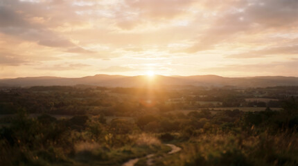 Obraz premium Sunset glow over desert landscape with mountains