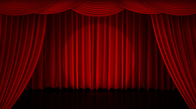 The stage backdrop was decorated with red curtains and illuminated by spotlights.