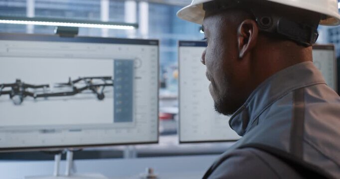 Engineer Verifies Machined Component Dimensions Against CAD Model on Monitor, Combining Physical Measurement With Digital Twin Technology For Robotic Manufacturing, Prototyping, Metrology and Design.