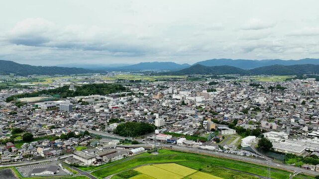 Aerial drone footage over urban area of Iga City, Mie, Japan