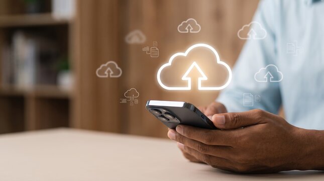 of hands holding smartphone with glowing cloud upload icon, mobile data transfer, wireless connectivity, digital storage synchronization, internet network communication
