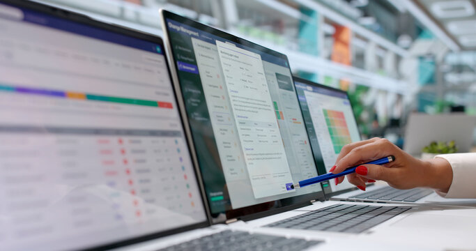 Woman Reviews Change Request Workflow On Laptop