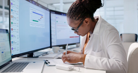 Medical Billing Specialist Reviews Patient Insurance Claims
