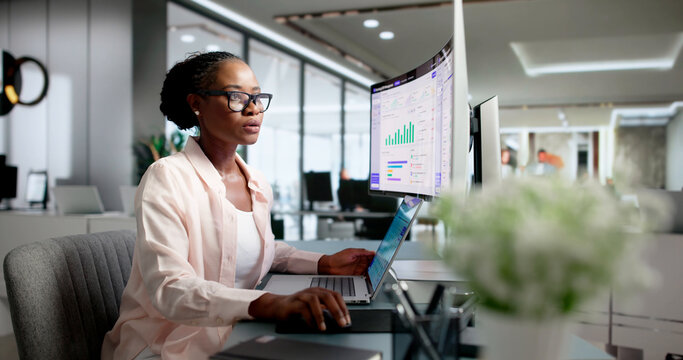 Procurement Manager Reviews Multiple Vendor Proposals Carefully