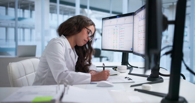 Medical Coder Carefully Reviews Electronic Health Records