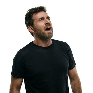Frustrated man groan 40 year old caucasian male in black t-shirt isolated on a transparent background for commercial design projects