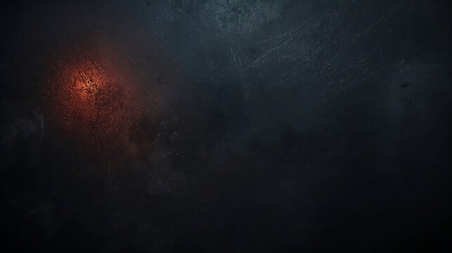 Dark textured surface with orange glowing particles and dust atmosphere dark texture orange light abstract