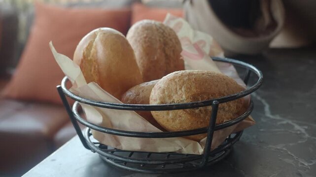 Enjoying bread selection at a cafe