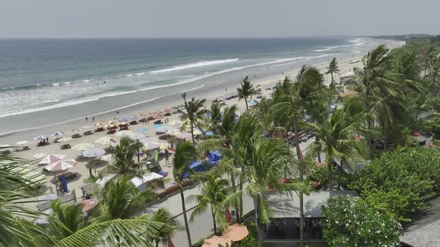 Aerial view of coastline of Kuta beach in Bali island, Indonesia