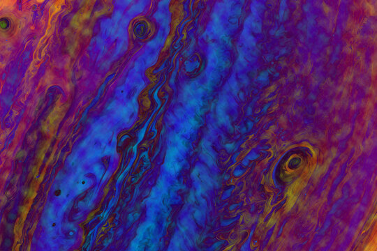 Meerkat standing on a colorful pixelated background