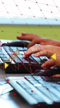Animation of data processing against mid section of kids using computer at school