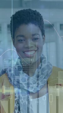 Animation of multiple graphs with changing numbers and buildings over smiling woman