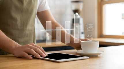 Fototapeta premium Person using tablet with digital interface showing progress and shopping icons.