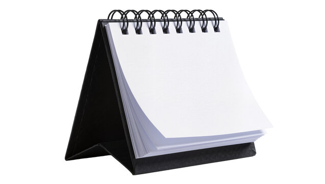 Black spiral-bound desk calendar with blank white pages, isolated on transparent background