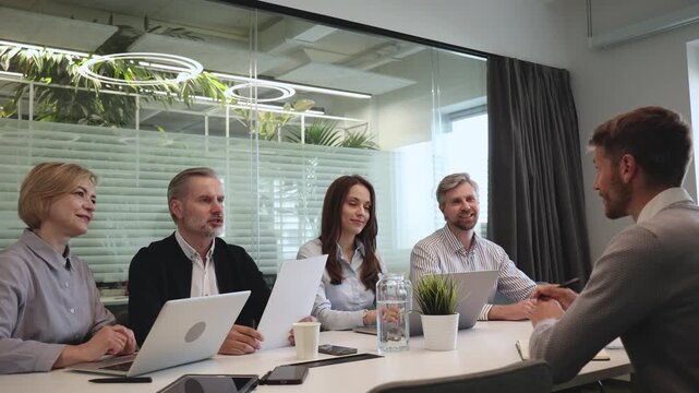 Job interview process is in office. Human resources, meeting and group of hiring candidates for vacancy