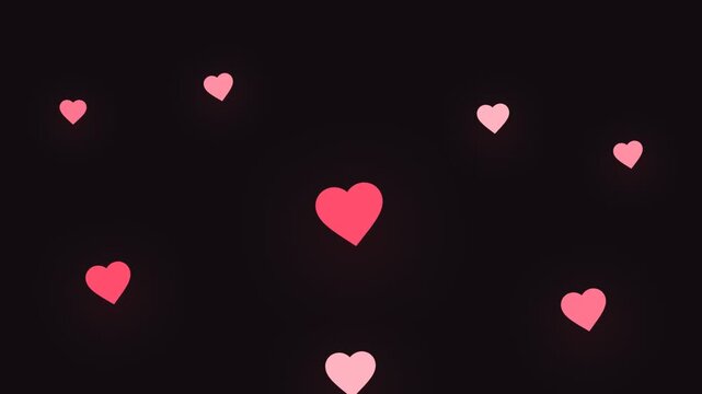 Glowing pink and red hearts on a dark background