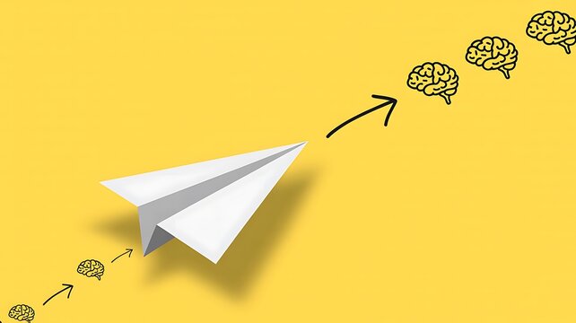 Creative innovation concept with paper airplane flying toward brain symbols on a bright yellow background