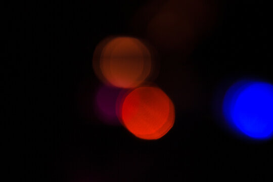 Colorful bokeh lights on black background