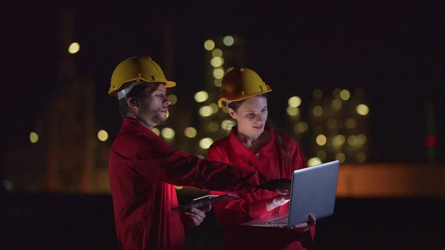 Industrial engineers inspecting an oil and gas refinery, reviewing plant operations and discussing maintenance, safety and energy infrastructure, refinery plant industry factory, Petrochemical plant.