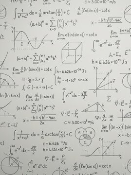 Hand Drawn Mathematical Formulas and Physics Equations on White Background for Scientific Research and Education