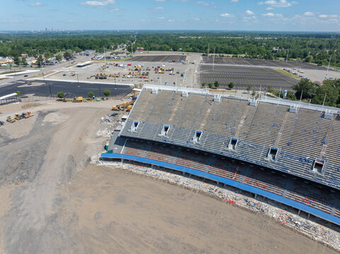 Orchard Park, New York, United States - 19 July 2026: Aerial view of the demolition of the former Highmark Stadium, showing the east end zone, seats, construction equipment, and parking lots.