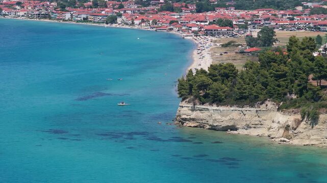 Skala Fourkas coastline showing turquoise water sandy beach