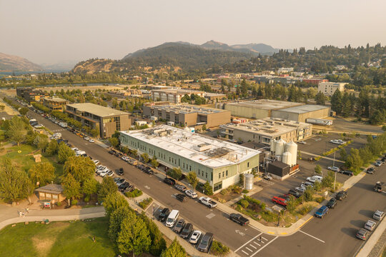 Hood River, Oregon, United States - 13 August 2026: Aerial view of pFriem Family Brewers under hazy skies affected by wildfire smoke in the Columbia Gorge.