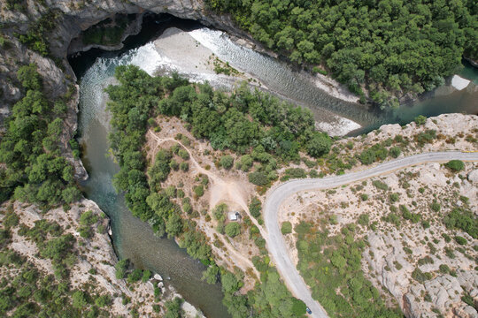 Aerial view of Meander of Congost de Collegats in Noguera Pallaresa river gorge on sunny summer day. Lleida, Catalonia, Spain.