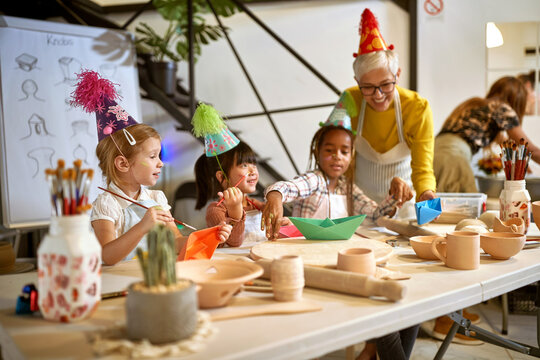 kids painting  on a creative birthday party.  Creative, hobby ,workshop  concept
