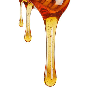 Golden honey dripping on white background | Macro liquid syrup flow isolated | Organic sweet nectar drops | Pure maple syrup splash close-up
