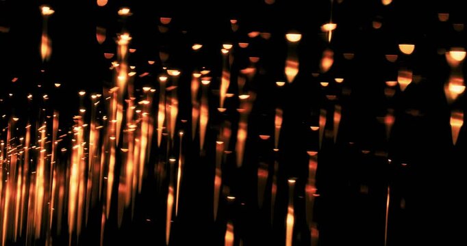 This metal sparkle abstraction on a dark background offers an enchanting visual experience, ideal for designers seeking captivating footage to elevate their projects with sophistication and allure