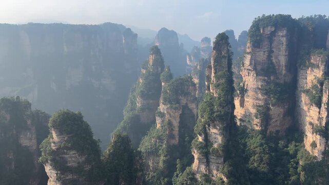 Scenic sandstone pillars at Zhangjiajie National Forest Park in China attract nature lovers and photographers