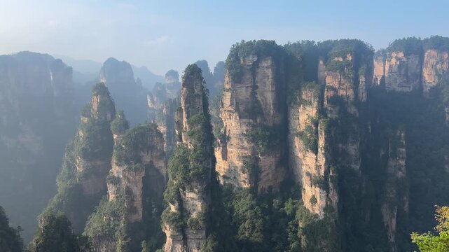 Scenic sandstone pillars at Zhangjiajie National Forest Park in China attract nature lovers and photographers