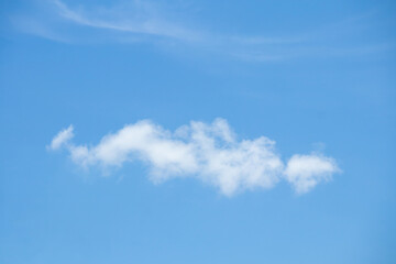 Obraz premium Beautiful blue sky with white clouds on a sunny day background
