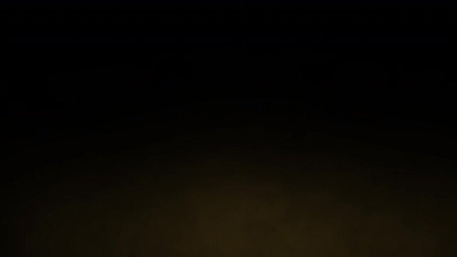 very low lying dirty brown orange smokey smog, smoke, fog or dust cloud of dusty dirt and rubble debris particles  moving slowly across the ground special effect overlay animation 4K